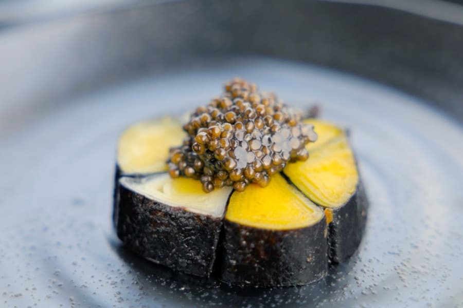 A course topped with caviar