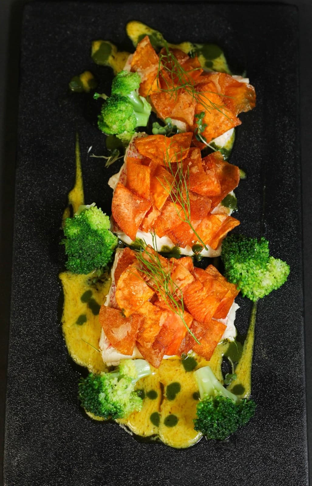 Red snapper in potato scales