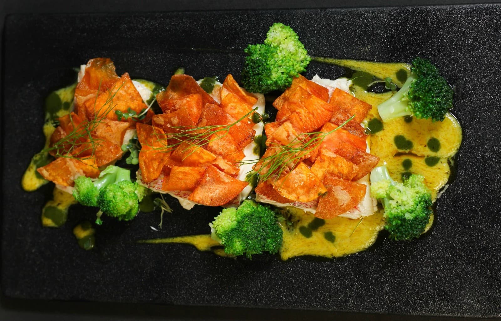Red snapper in potato scales