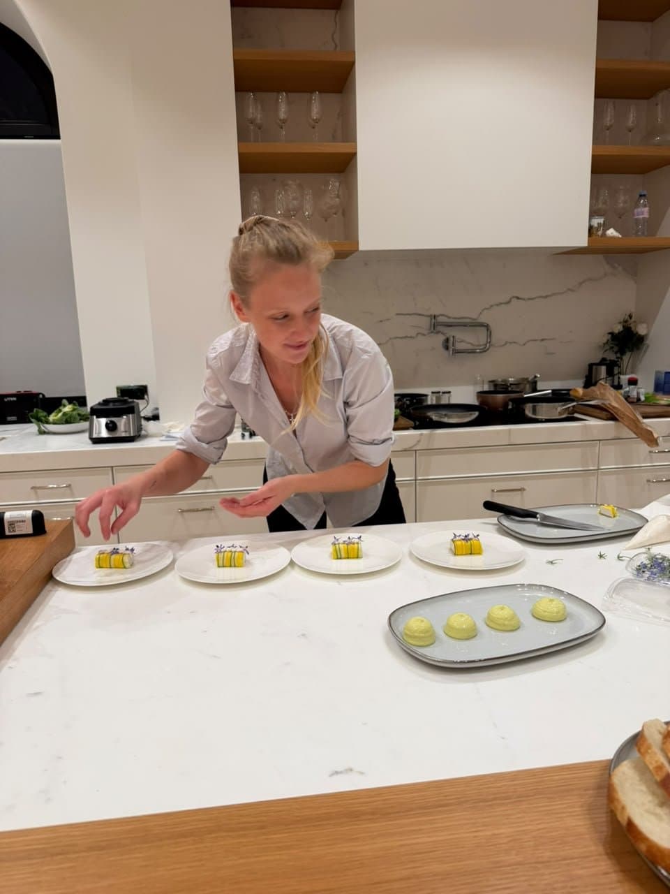 Chef Juliette plating a course